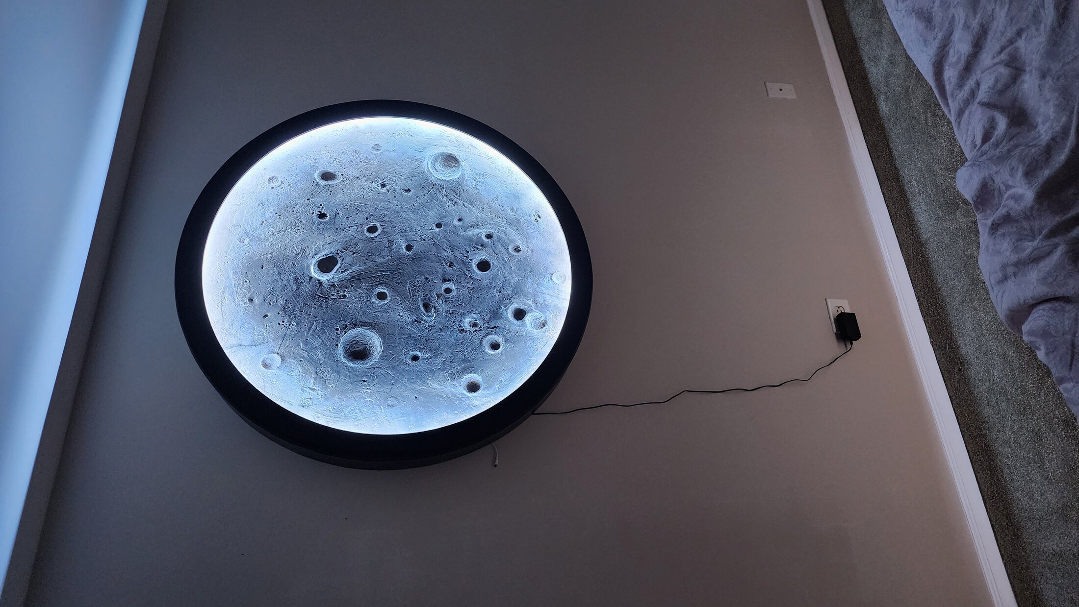 Custom moon light with a cool white glow